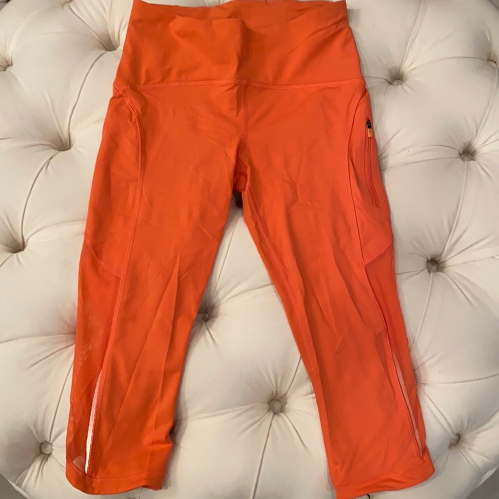 Bright orange lululemon cropped leggings - size 4